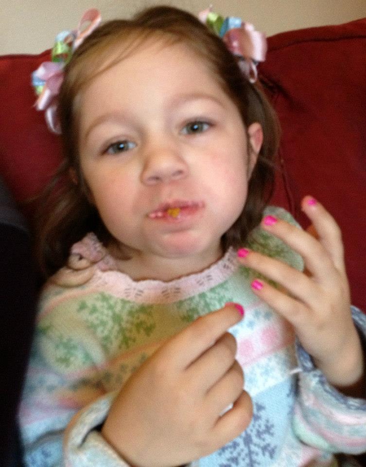 Cana thoroughly enjoying her cupcake. Apparently she had 3. 